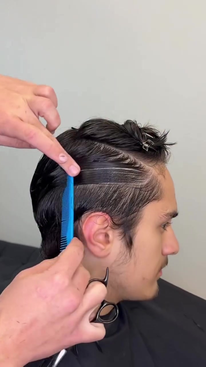 Close-up of scissor work in the chair